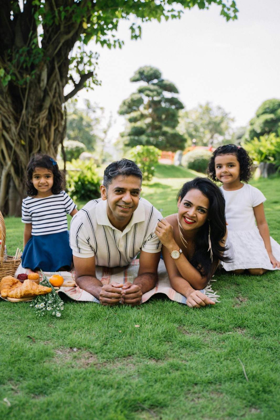 Family enjoying a community green space in a Denver neighborhood.