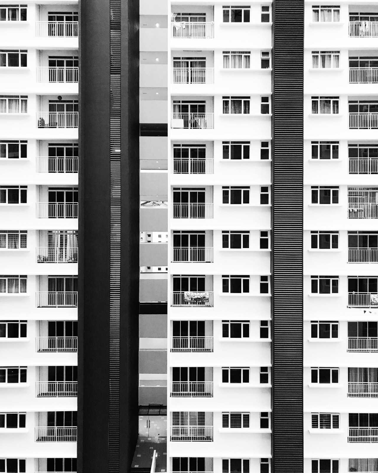 Modern condominium building representing professionally managed community association services.
